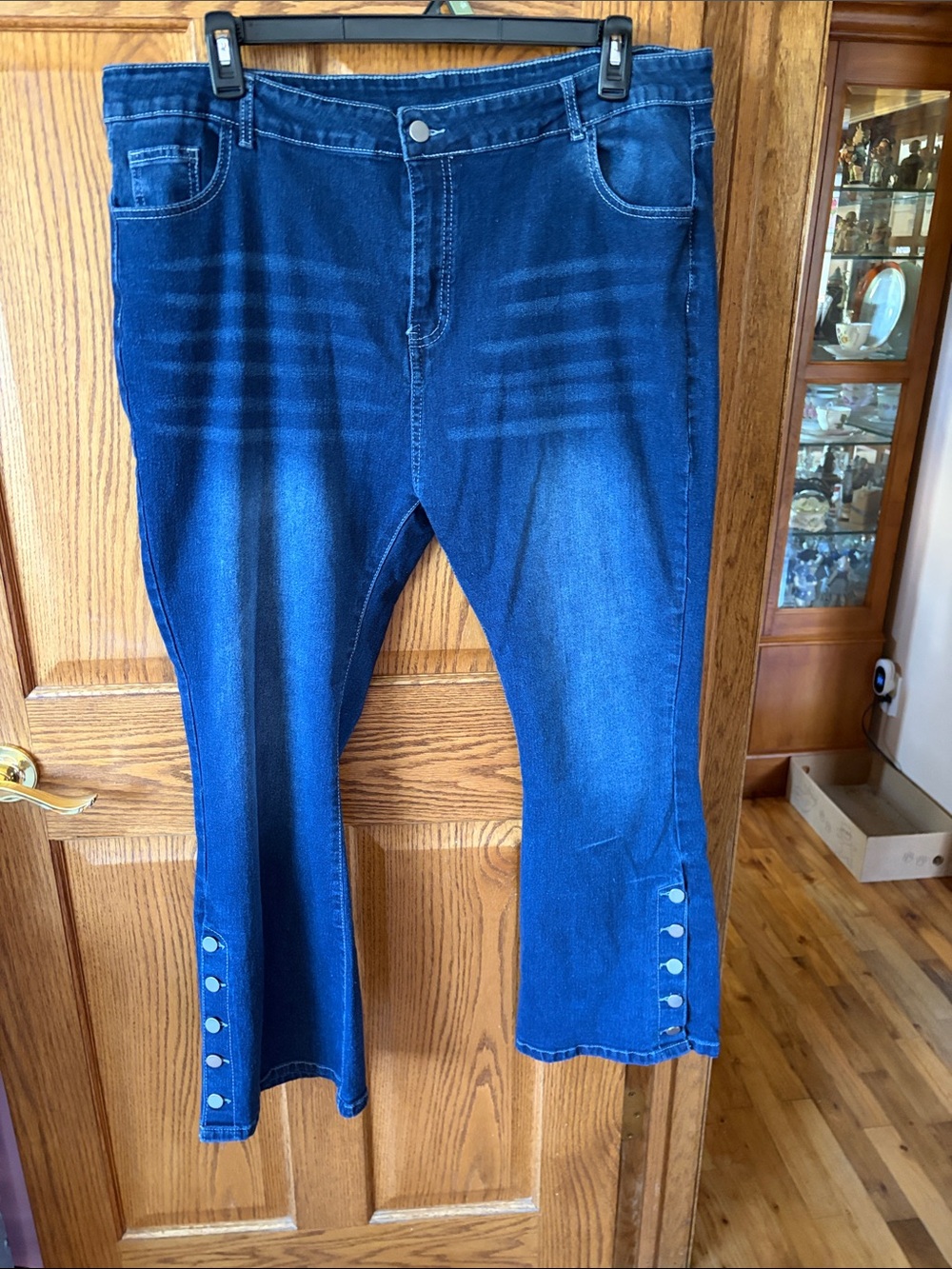 Amazon Women's Dark Blue Flare Jeans with Button Hem